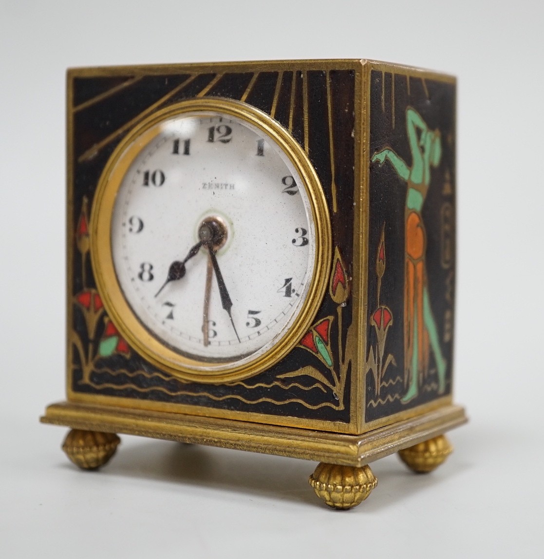 A Zenith champleve enamel Egyptianesque travelling alarm clock in case, 10cm total height